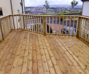 Roe Landscapes Paving & Landscaping Specialists, Dungiven, Wood decking over looking driveway