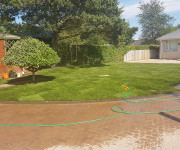 Roe Landscapes Paving & Landscaping Specialists, Dungiven, hose watering new grass
