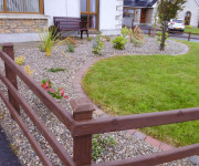 Roe Landscapes Paving & Landscaping Specialists, Dungiven, Fence with stone and grass front garden