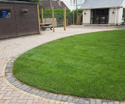 Roe Landscapes Paving & Landscaping Specialists, Dungiven, wood shed with paving and grass