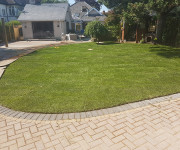 Roe Landscapes Paving & Landscaping Specialists, Dungiven, watering garden in process