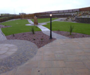 Roe Landscapes Paving & Landscaping Specialists, Dungiven, paving and rockery with grass and standing stone