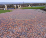 Roe Landscapes Paving & Landscaping Specialists, Dungiven, Red paving brick driveway with circle pattern