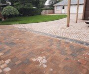 cleaning paving bricks with garden and swing