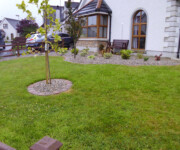 Roe Landscapes Paving & Landscaping Specialists, Dungiven, Grass and rockery with small plants and trees