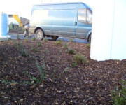 Roe Landscapes Paving & Landscaping Specialists, Dungiven, small shrubs and bark with van in the background
