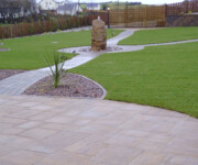 Roe Landscapes Paving & Landscaping Specialists, Dungiven, paving and rockery with grass and standing stone